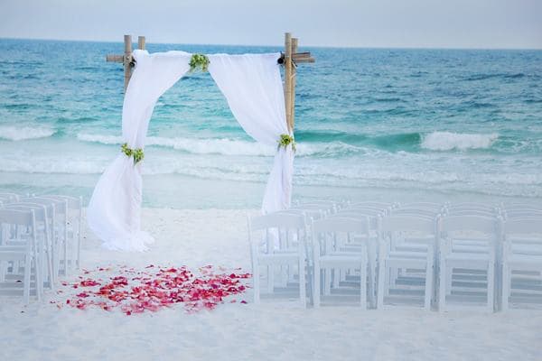 Florida beach wedding ceremony at golden hour